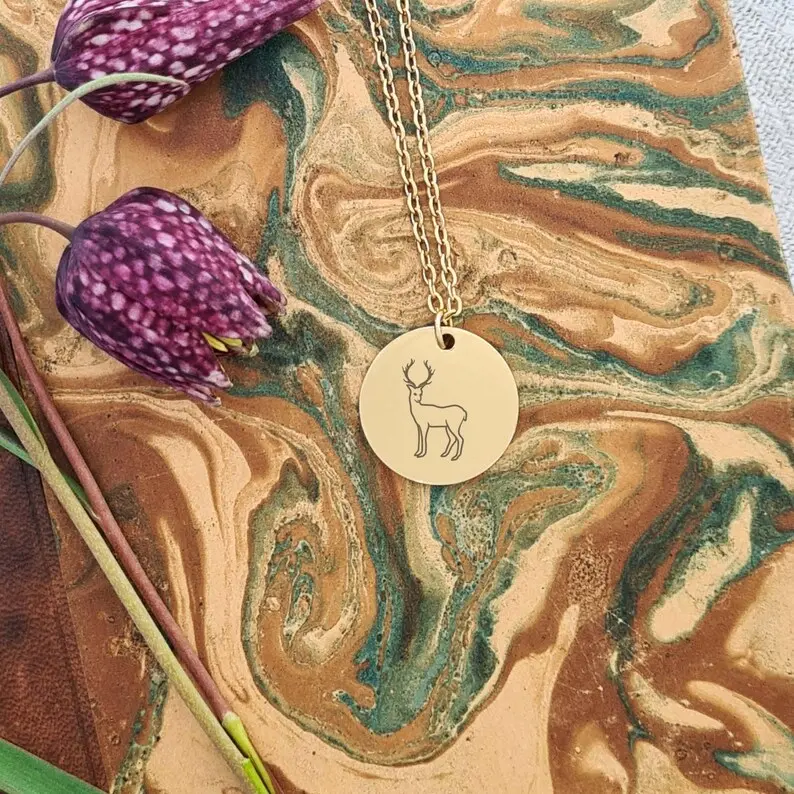 پلاک دایره ای استیل حکاکی گوزن کاج