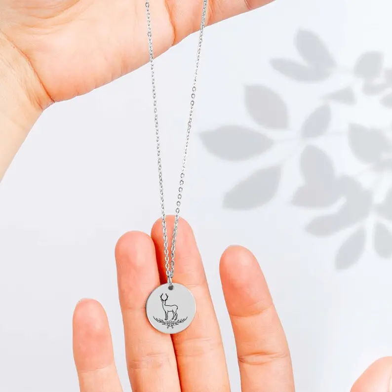 پلاک دایره ای استیل حکاکی گوزن کاج