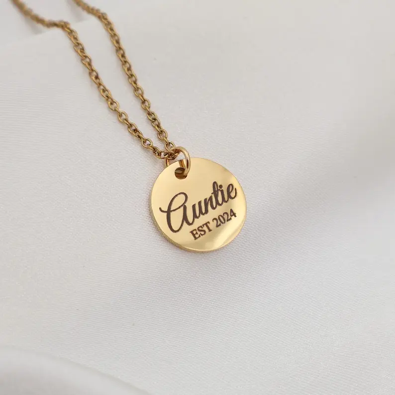 پلاک دایره ای استیل حکاکی اسم به همراه زنجیر (آبکاری طلایی)